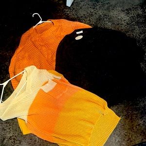 Three medium new/like new sweaters
